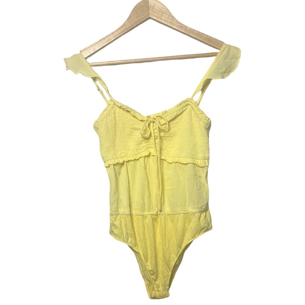 Pastel Yellow Bodysuit with Sweetheart Neckline and Ruched Bodice